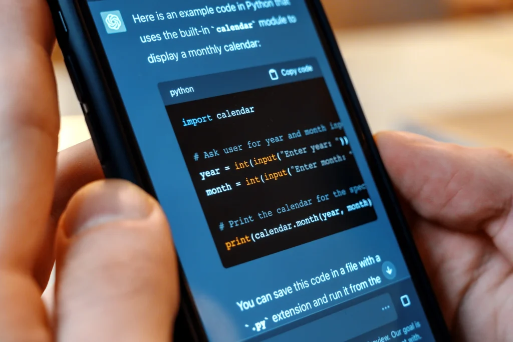 What is GEO in digital marketing example: a smartphone screen showing an AI chatbot response representing Generative Engine Optimization